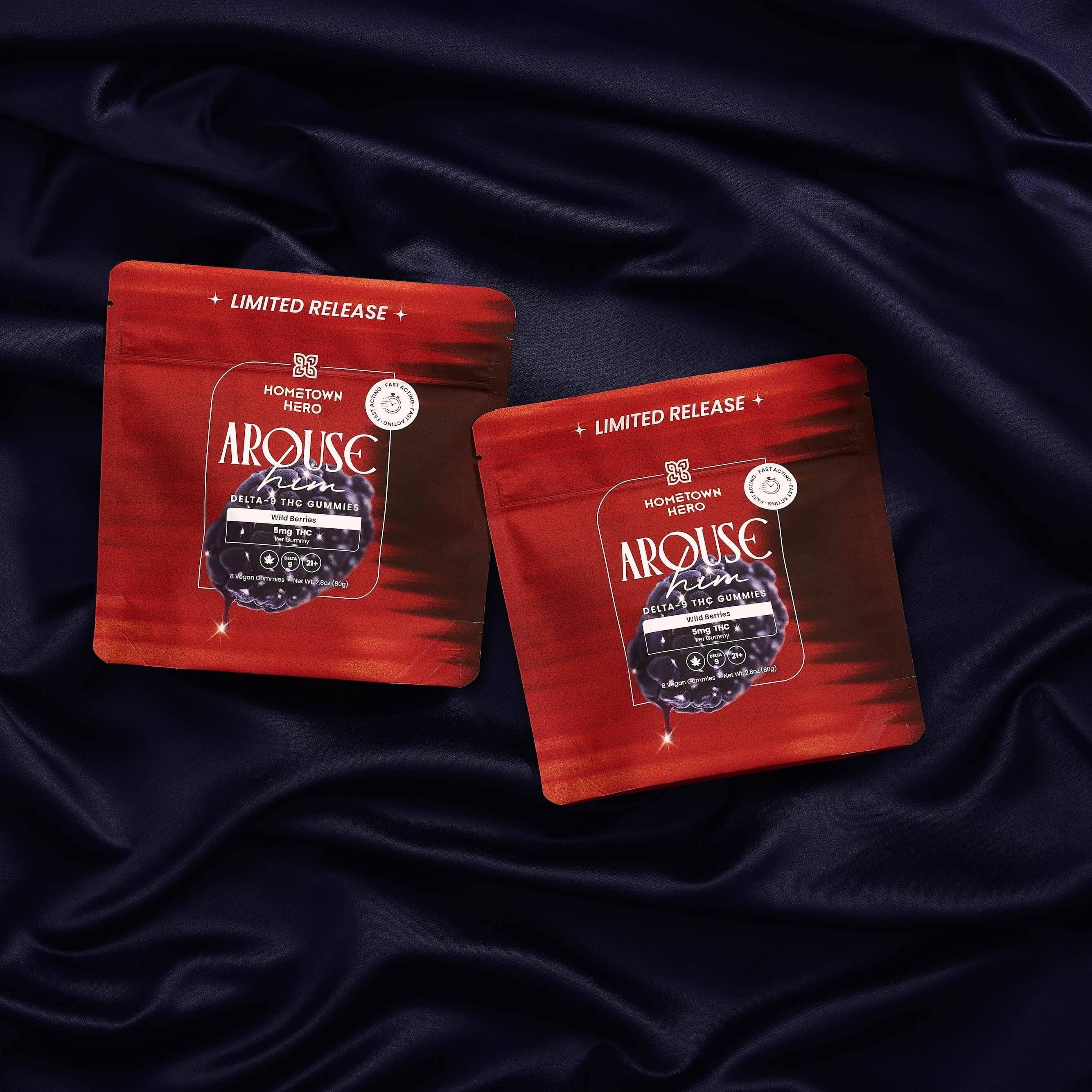 two red bags of gummies on purple sheets